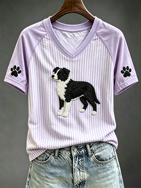 Perro lindo de las mujeres con las patas de la impresión rayada con cuello en V camiseta de manga corta